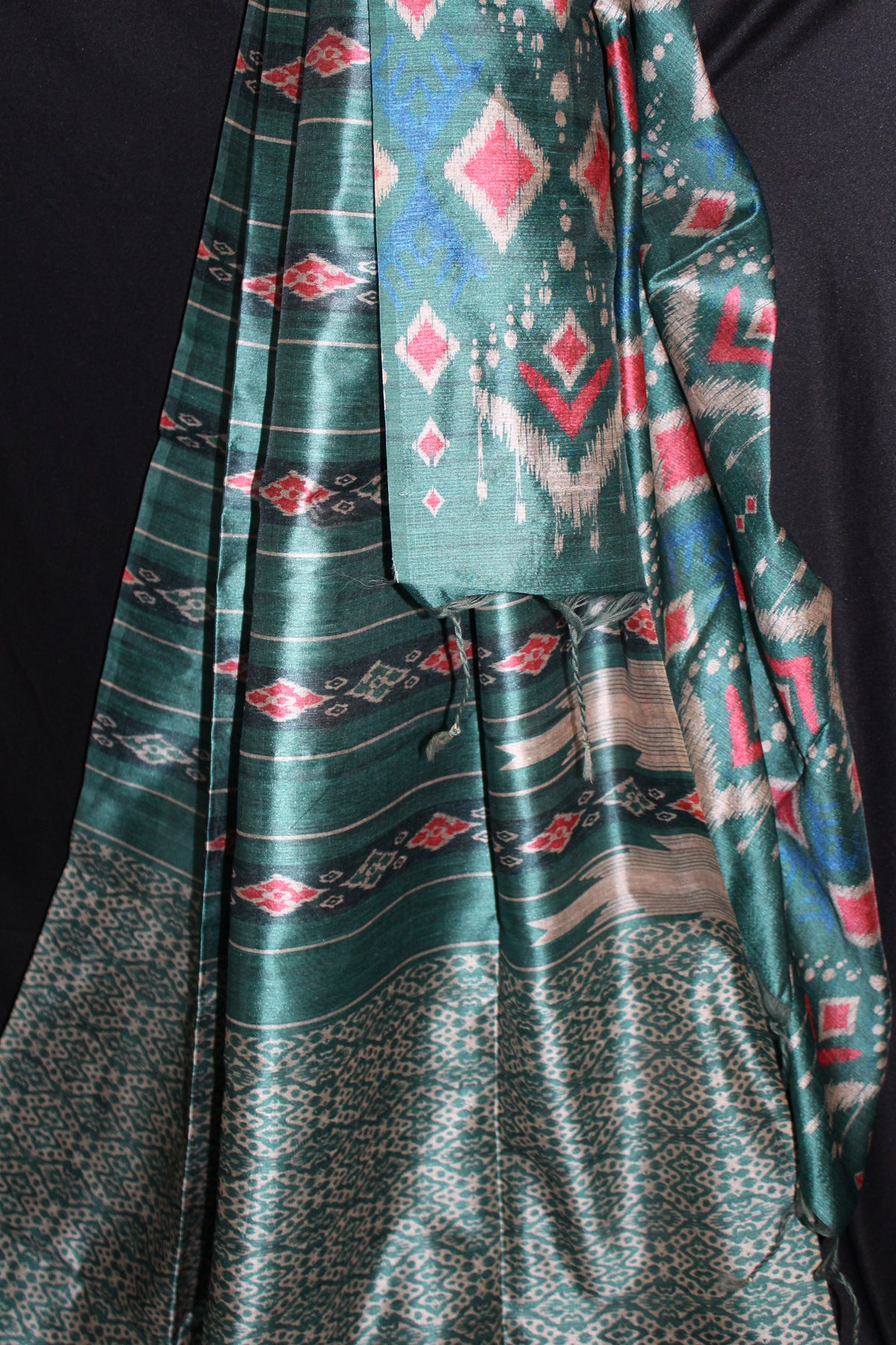 Teal Green Tussar Saree with Geometric Ikat-Inspired Motifs