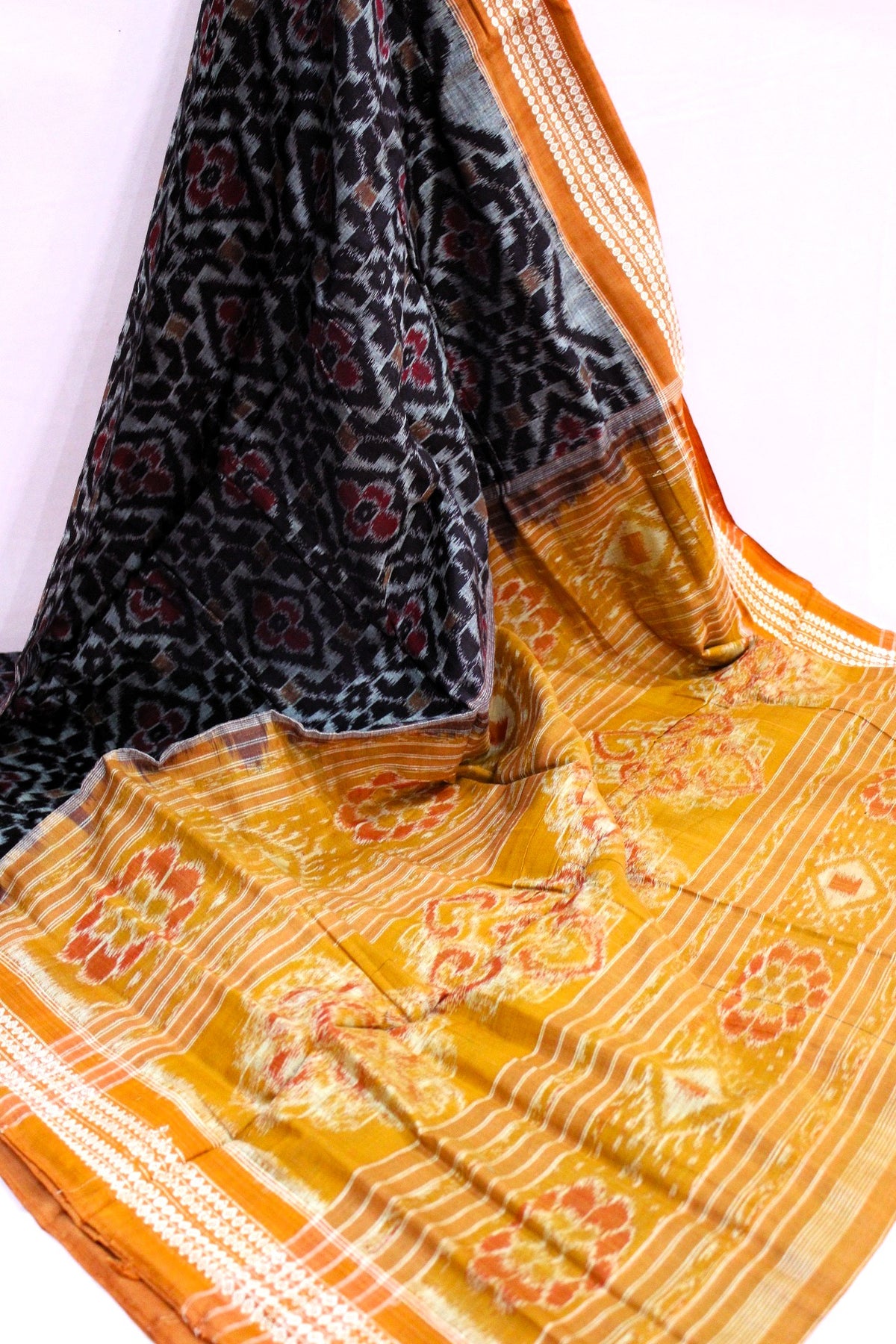 Black & Mustard Orange Floral Bandha Saree