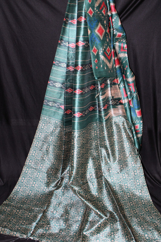 Teal Green Tussar Saree with Geometric Ikat-Inspired Motifs